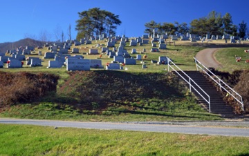 BETHEL CEMETERY 



- The 1854 cemetery reveals a panoramic view of Bethel Community. This burial ground is the location of the gravesite of Inman of <i>Cold Mountain</i> fame as well as of other historic figures from Bethel Community’s past. Visitors with the Cold Mountain Heritage Tour learn the long-secret place of Inman’s grave location as well as the haunting details of his demise on Big Stomp Mountain and subsequent burial by his father. Books 1 and 5 of <i>Legends, Tales & History of Cold Mountain</i> relay the history.  See also <i>Walking in the Footsteps of Those Who Came Before Us</i> DVD.